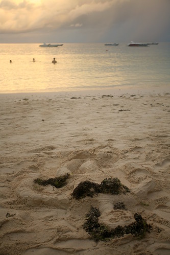 a bikini sandcastle