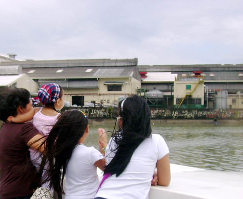 A Family on deck observing the Pandacan oil depo