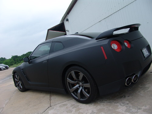  vehicle wraps including a Carbon wrapped boat and Matte Flat Black GTR