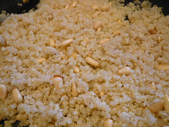 Toasting quinoa and pignoli.