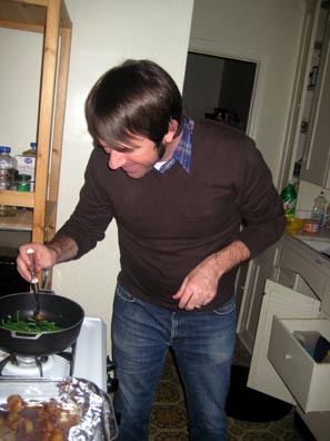 Brian making dinner