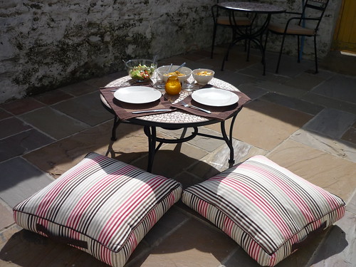 cute patio table with cushions seats