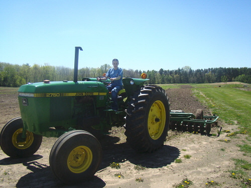 520 Casey Driving the Tractor
