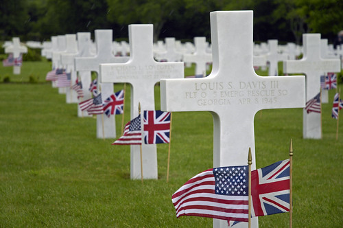 Flags decorate the graves of U.S. service members on Memorial Day at the Cambridge American Cemetery and Memorial in Madingley, England