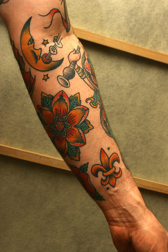 Stoney St Clair Moon and Fleur de Lis tattoos by Scott Harrison
