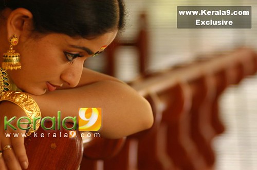 Actress Kavya Madhavan in pensive or shy mood