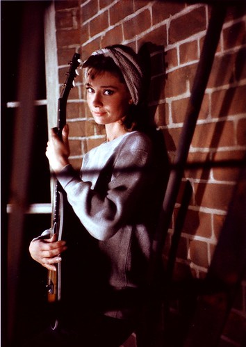 Audrey Hepburn Playing Guitar in Breakfast at Tiffany's