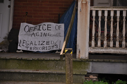A sign on a porch on Main Street in New Providence, PA.