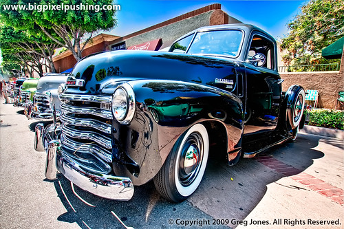 Another low angle view of this classic black 1949 Chevy truck