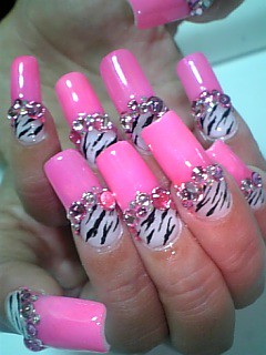 Pink nails with zebra stripes decorated nail art 