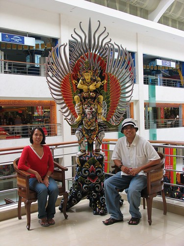 posing with the Garuda