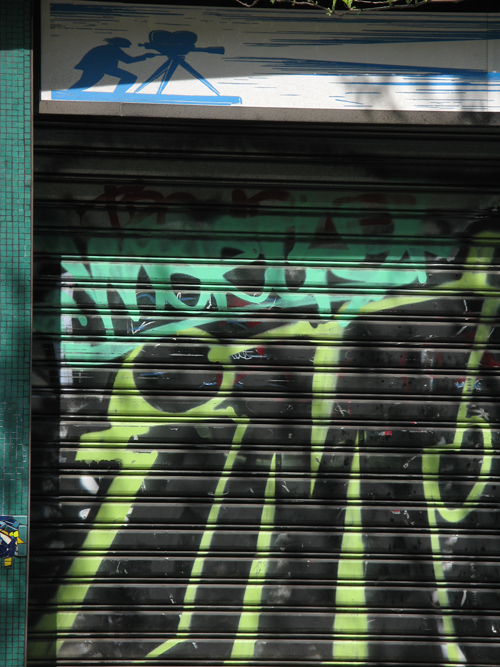 graffiti and a little cameraman, Manhattan, NYC