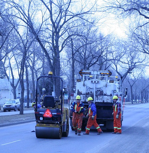 Workers fill potholes in Edmonton