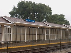 The Metra Wstern Avenue station duriing a summer rainshower. Chicago Illinois. August 2006.
