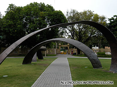 Huge arches in front of the museum, probably an installation artwork