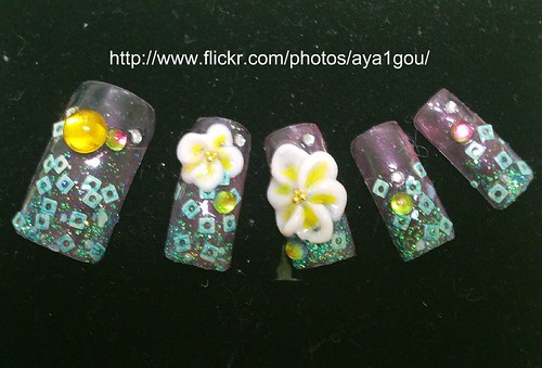 A set of artificial nails with 3d tropic style of flower nail design 
