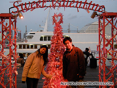 Mark and Meiyen beside a Valentines Day wishing tree