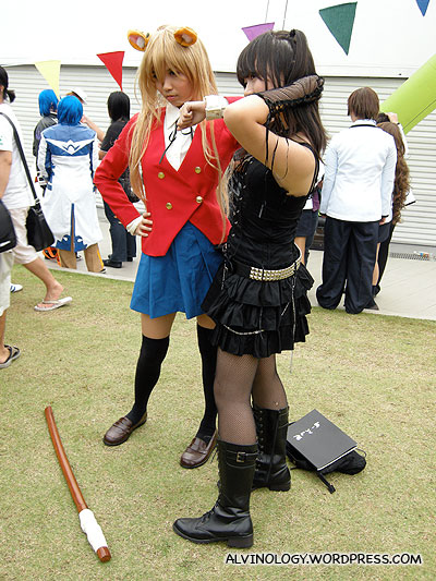 Girl in black is Misa in Deathnote, not sure about the other girl