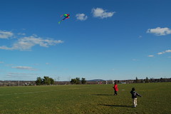 Ezra flying kite with Owen