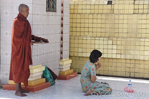 botataung monk and lady worshipper