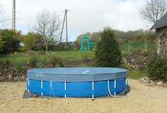 Swimming pool with new pool cover