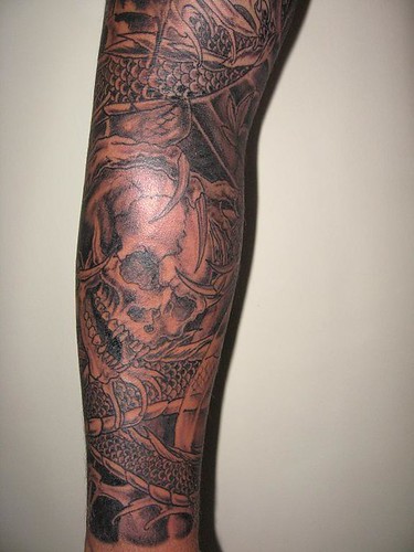 Black and gray sleeve tattoo designs with skull