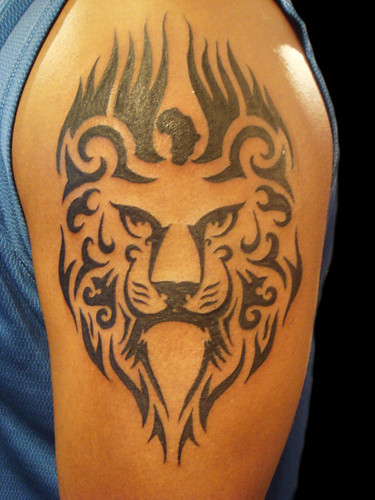 Tribal Lyon tattoo by Miguel Angel tattoo. Miguel Angel Custom Tattoo Artist 