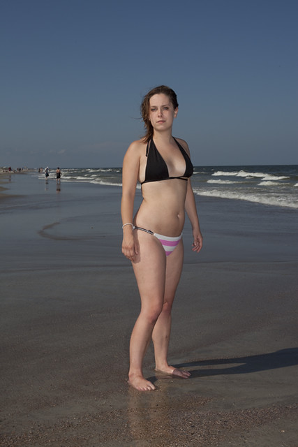 Sexy woman on beach in bikini