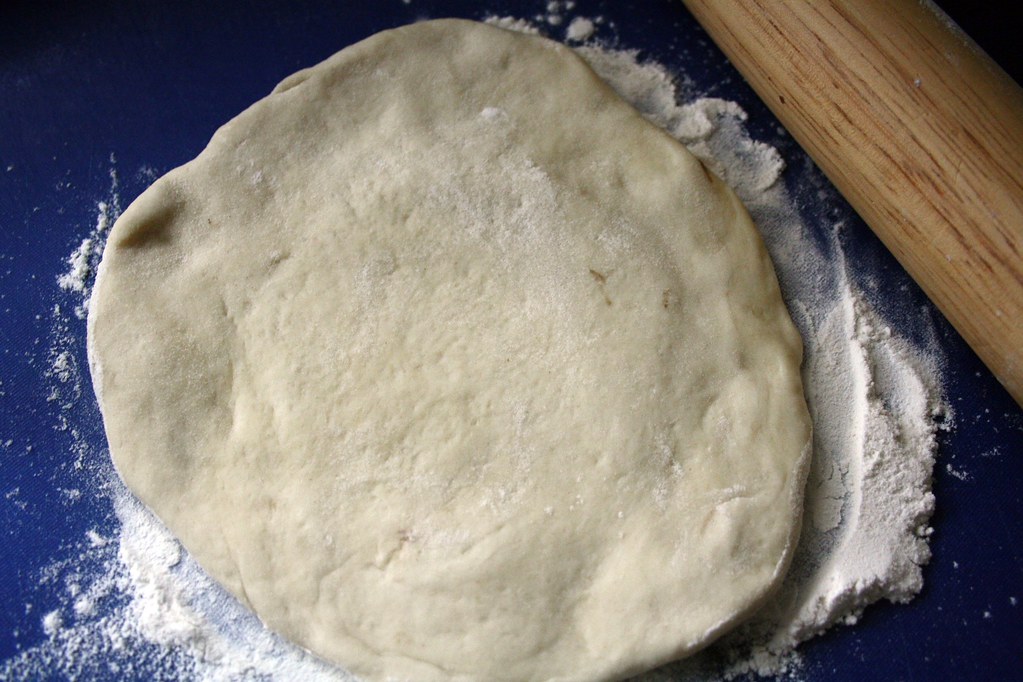 Rolling out the pizze dough