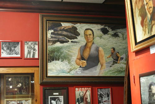 Who Doesn't Want A Giant Painting Of Burt Reynolds In "Deliverance" Hanging On Their Wall?