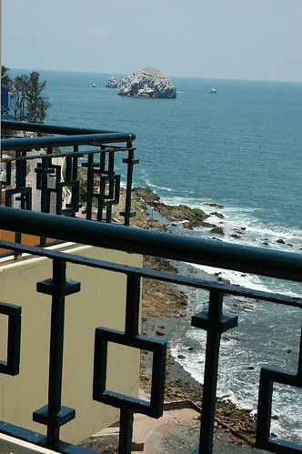Islands off South Mazatlan in the Pacific Ocean, through a metal fence, Hotel Freeman, Sinaloa, Mexico from 10 stories up by Wonderlane