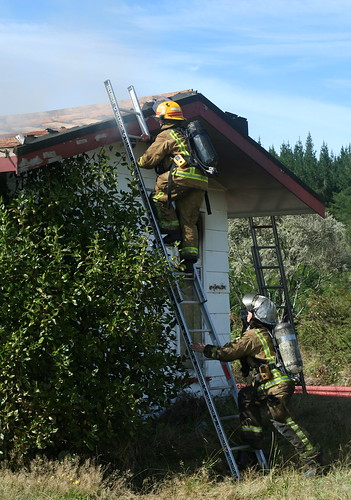 Climbing a ladder - Fire training - fire fighter
