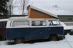 Blue Bay Window VW Bus Campmobile with extended roof up in Wasilla, Alaska - Passenger Side View