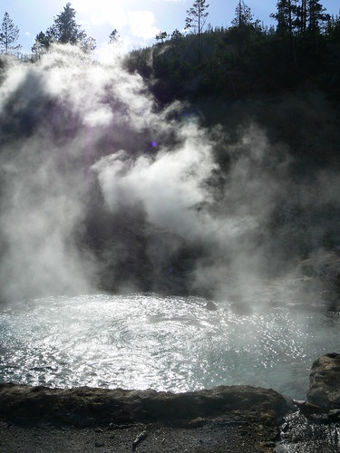 Steam coming off hot pool in Yellowstone park wyoming