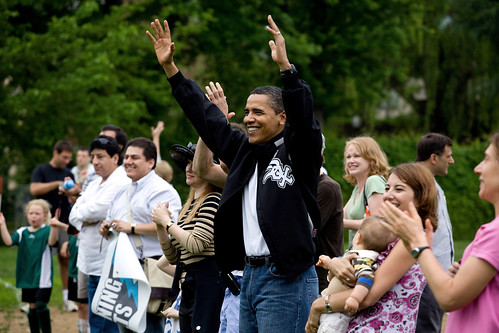 President Barack Obama cheers for his daughter Sasha's soccer team at a park in Washington, D.C. on May 16, 2009