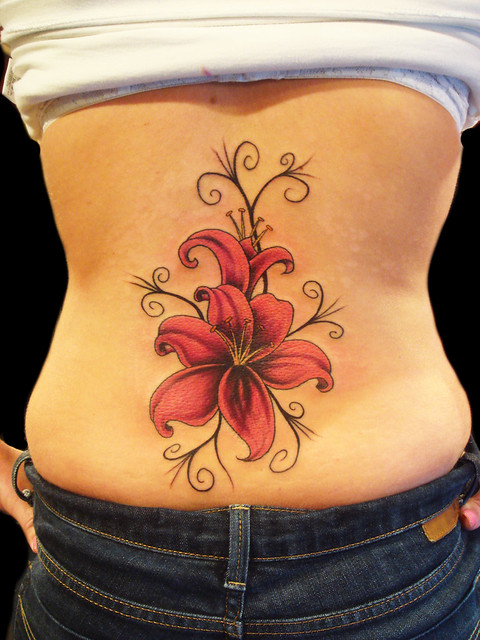 lower back girl Lily Flower tattoo