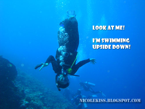 swimming upside down