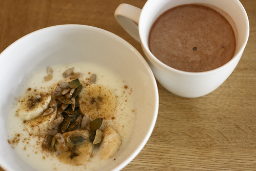 Yogurt, bananas and seeds with a little taster of Tim's chocolate protein smoothie