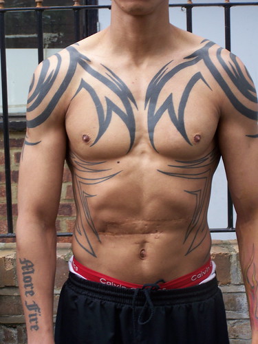 tribal black tattoos. free hand lack tribal tattoo