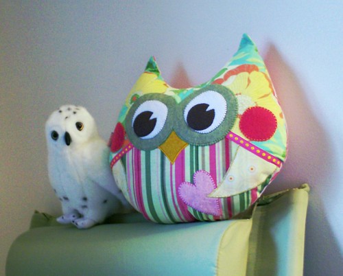 Stuffed realistic snowy owl and cute kawaii handmade sewn stylized owl plushie