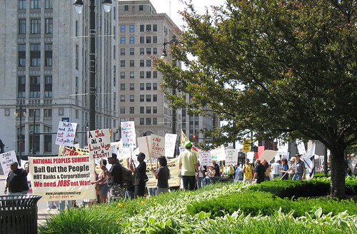 People's Summit participants line-up outside Grand Circus Park in downtown Detroit for a march on GM World Headquarters on June 15, 2009. The Summit demanded full-employment in the US. (Photo: Alan Pollock) by Pan-African News Wire File Photos
