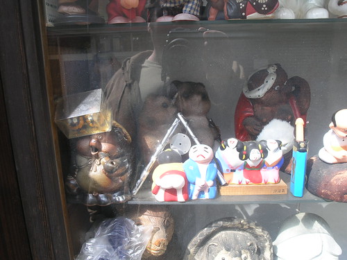 Phallic Figures in a window in Koenji