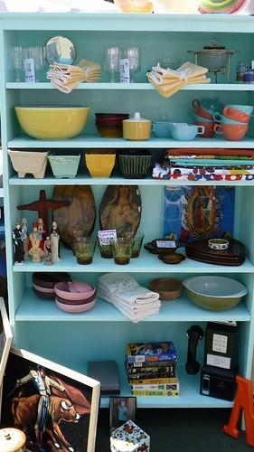 Wonderful aqua shelves filled with vintage goods