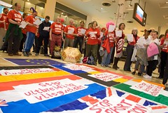 Anti-aviation campaigners put new words to old Eurovision favourites as they join together at Heathrow Terminal One to protest against the 3rd runway and aviation expansion. by Euroflashmob Heathrow and Europe