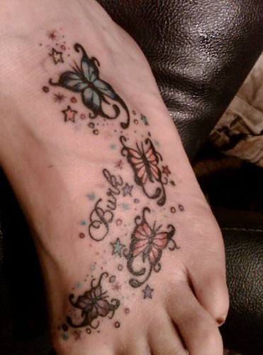 butterfly foot tattoos. blue-utterfly-tattoos. Foot