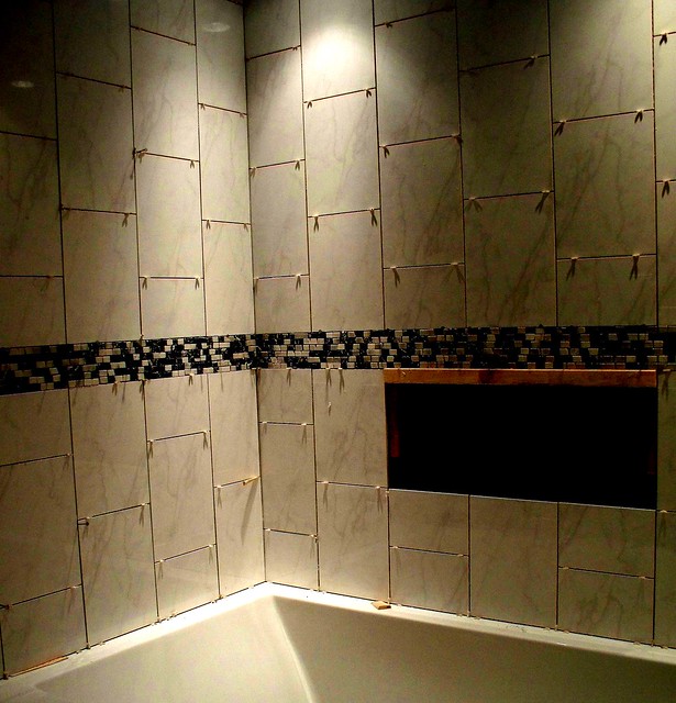 Tiled Soaker Tub/Shower Installation. The big black hole in the wall is for 