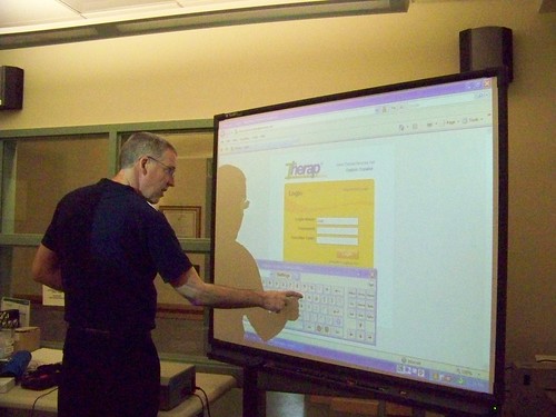 Justin showing Therap application on smart Board.