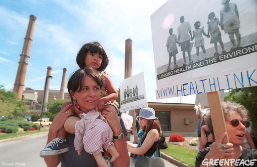 A mother and daughter protest the Salem Coal Plant