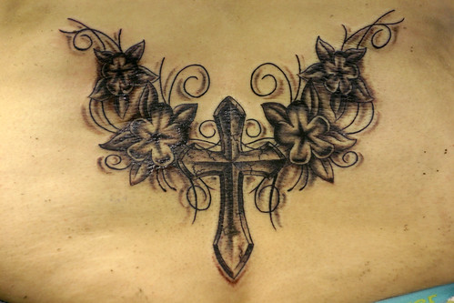 cross flowers and vines tattoo