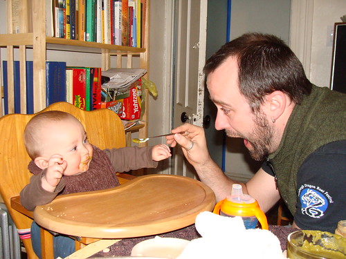 Papa feeding Silas